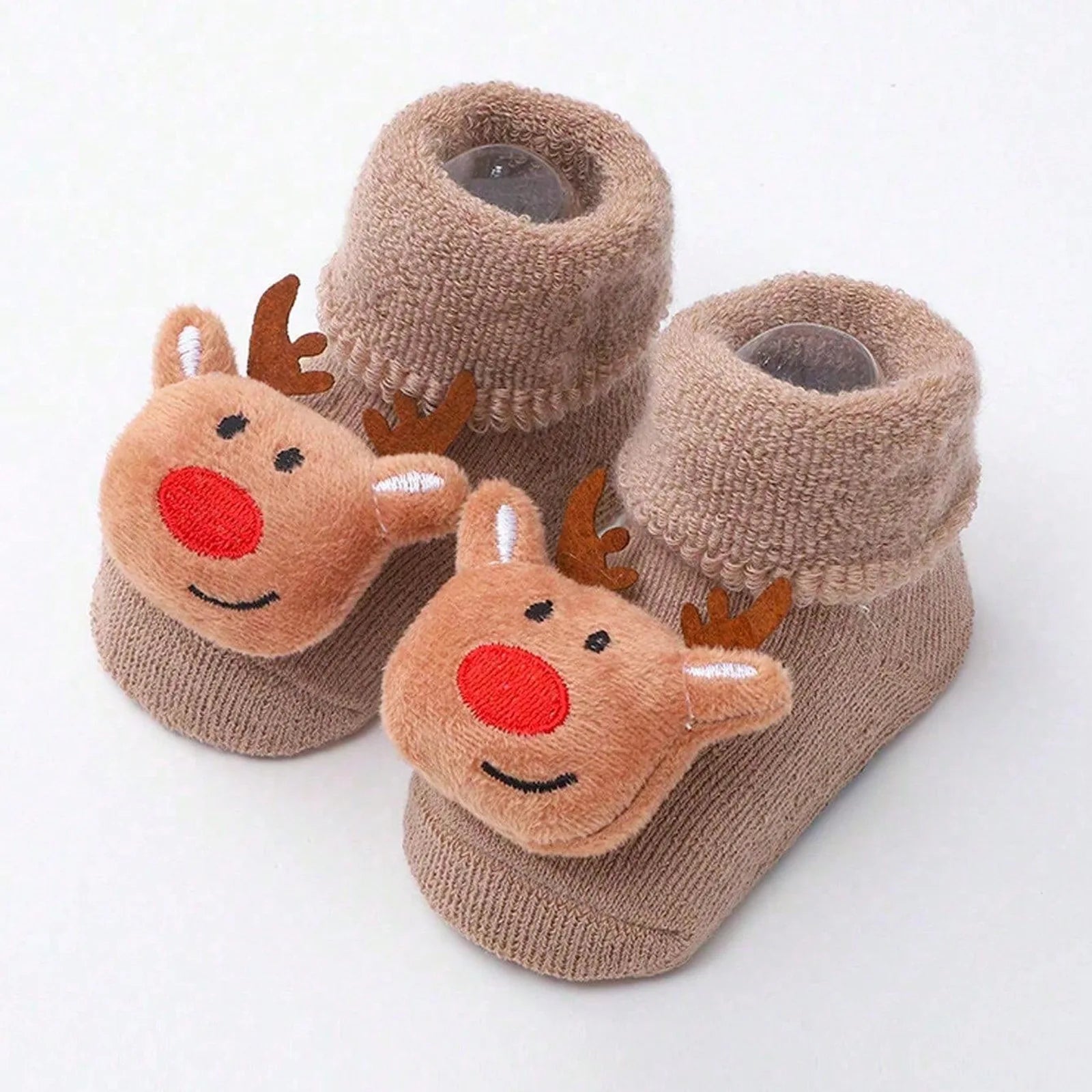 Calcetines Navideños Antideslizantes: Magia y Seguridad en sus Primeros Pasos (0-12M)