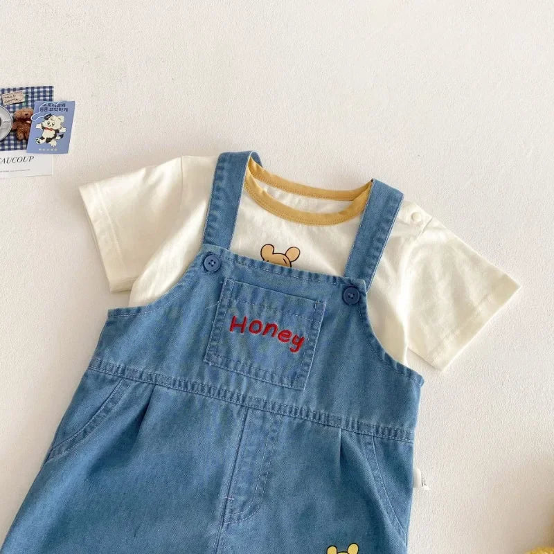 Camiseta y Short de Mezclilla con Tirantes de Winnie Pooh  (9M- 5T)