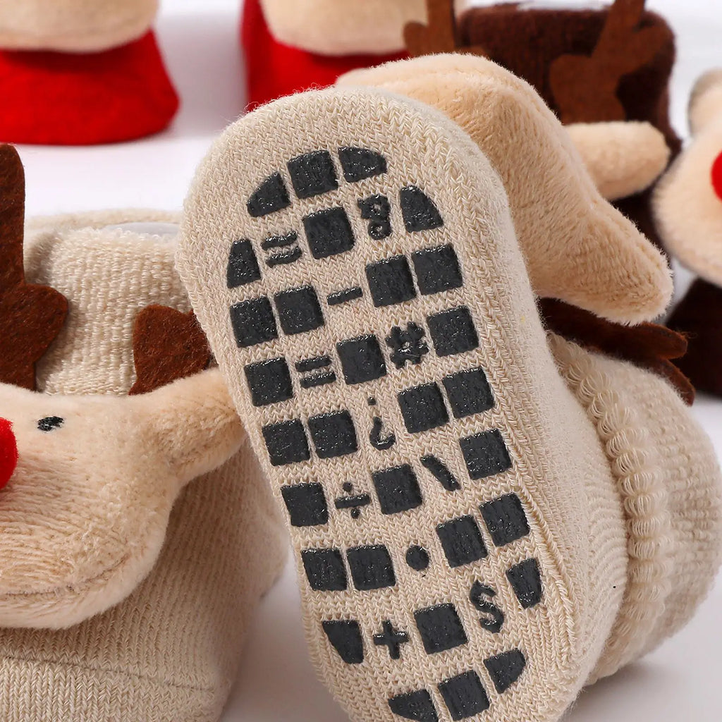 Calcetines Navideños Antideslizantes: Magia y Seguridad en sus Primeros Pasos (0-12M)
