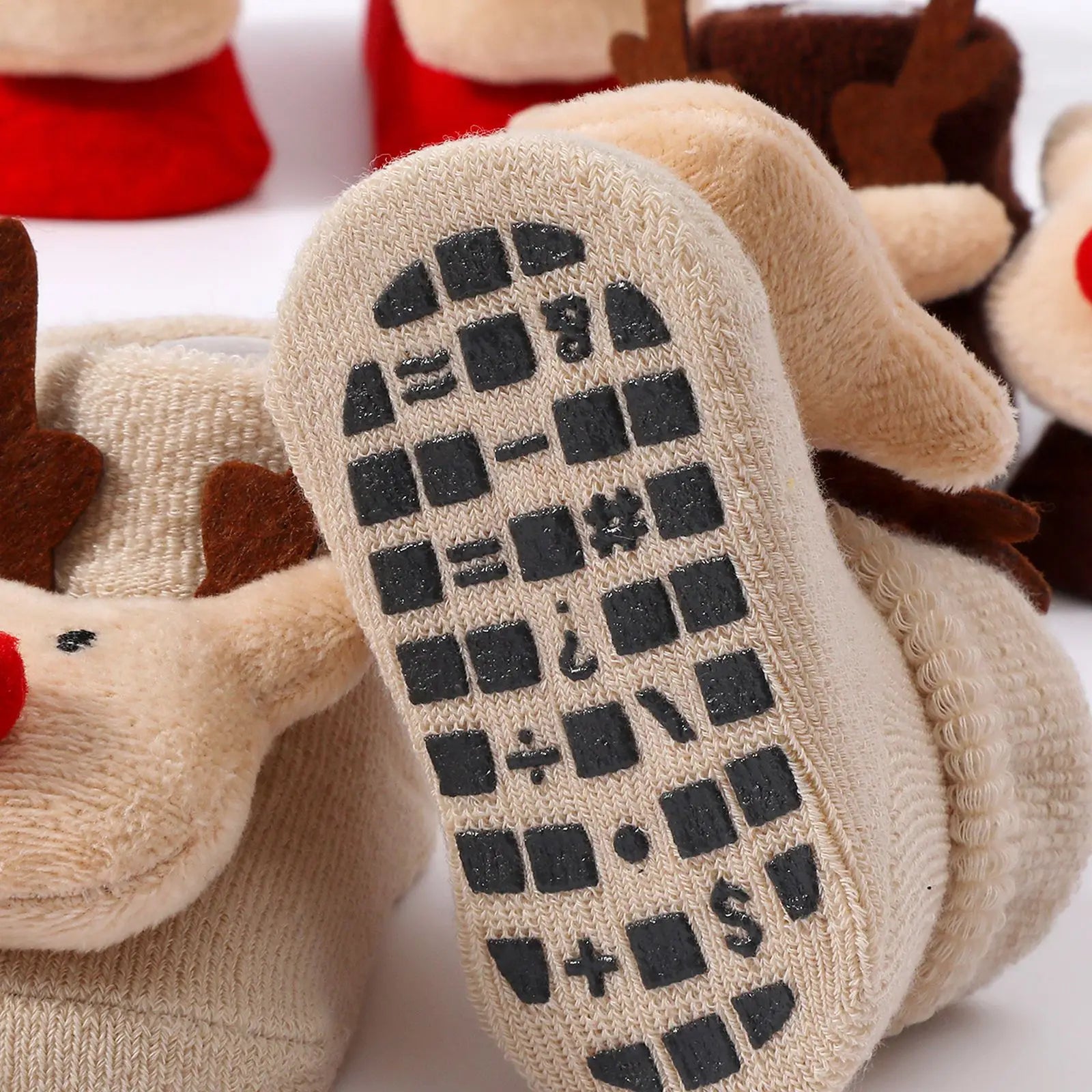 Calcetines Navideños Antideslizantes: Magia y Seguridad en sus Primeros Pasos (0-12M)